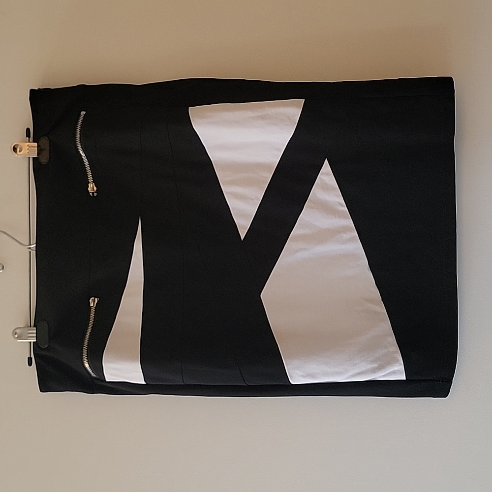 Black and white skirt with mock zipper pockets